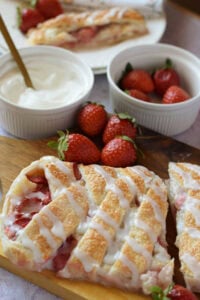 close up of a strawberry puff pastry danish.