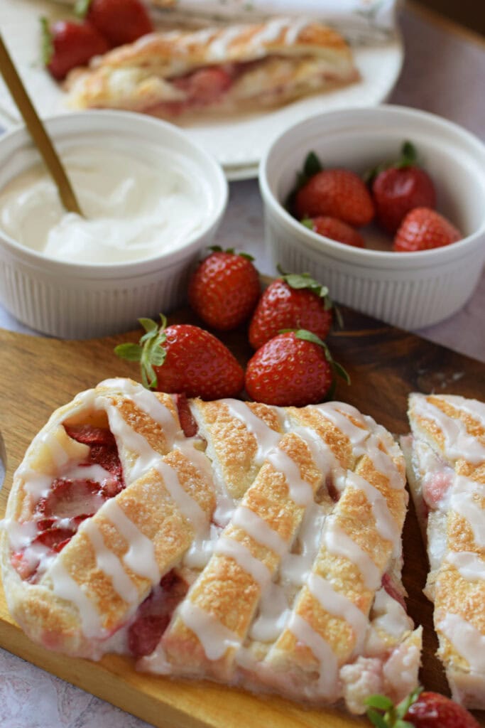 close up of a strawberry puff pastry danish.