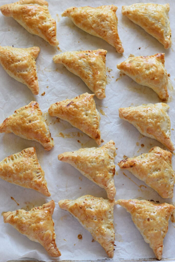 Baked pastries on a baking tray.