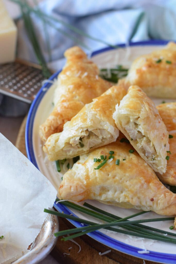 Close up of a chicken puff pastry bite.