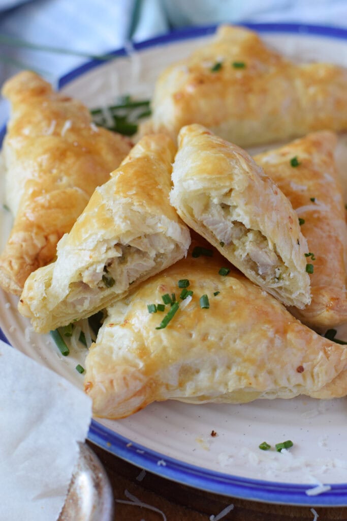 Chicken puff pastry bites on a plate.
