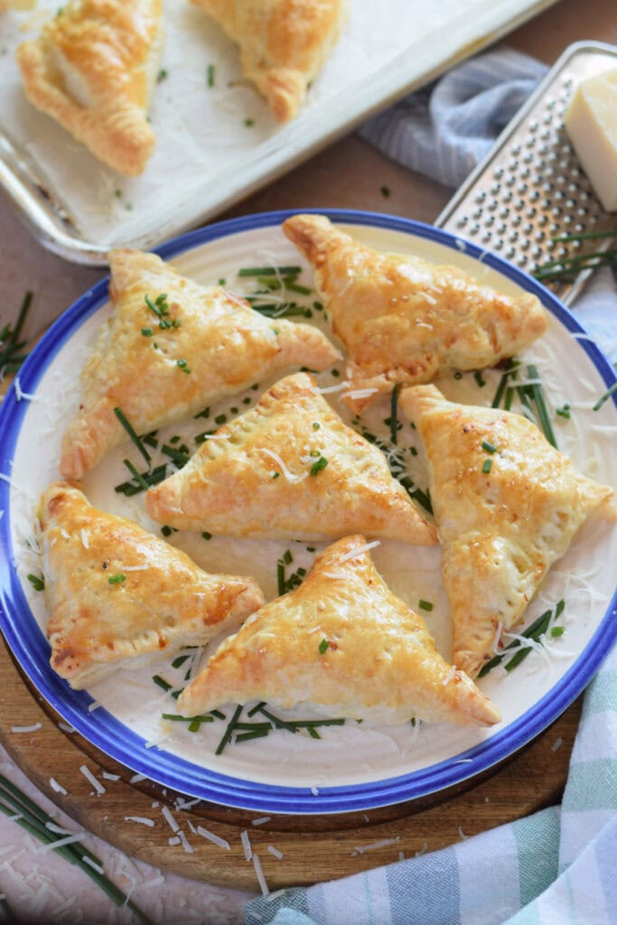 Chicken pastries on a plate.