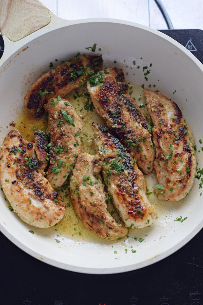 Chicken tenders in garlic butter.