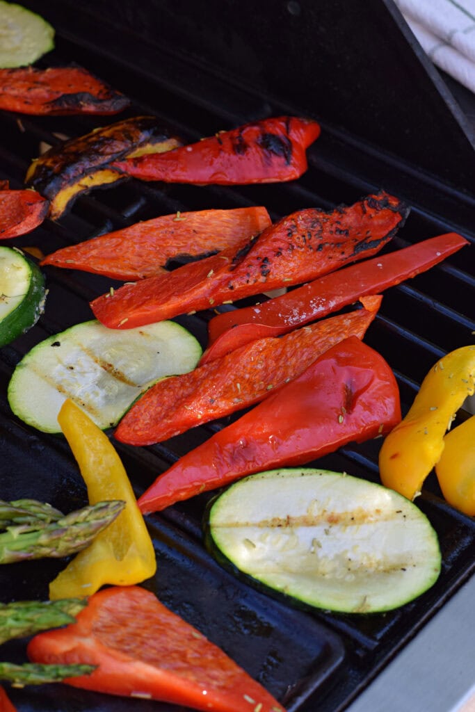 Cooking vegetables on a barbecue.