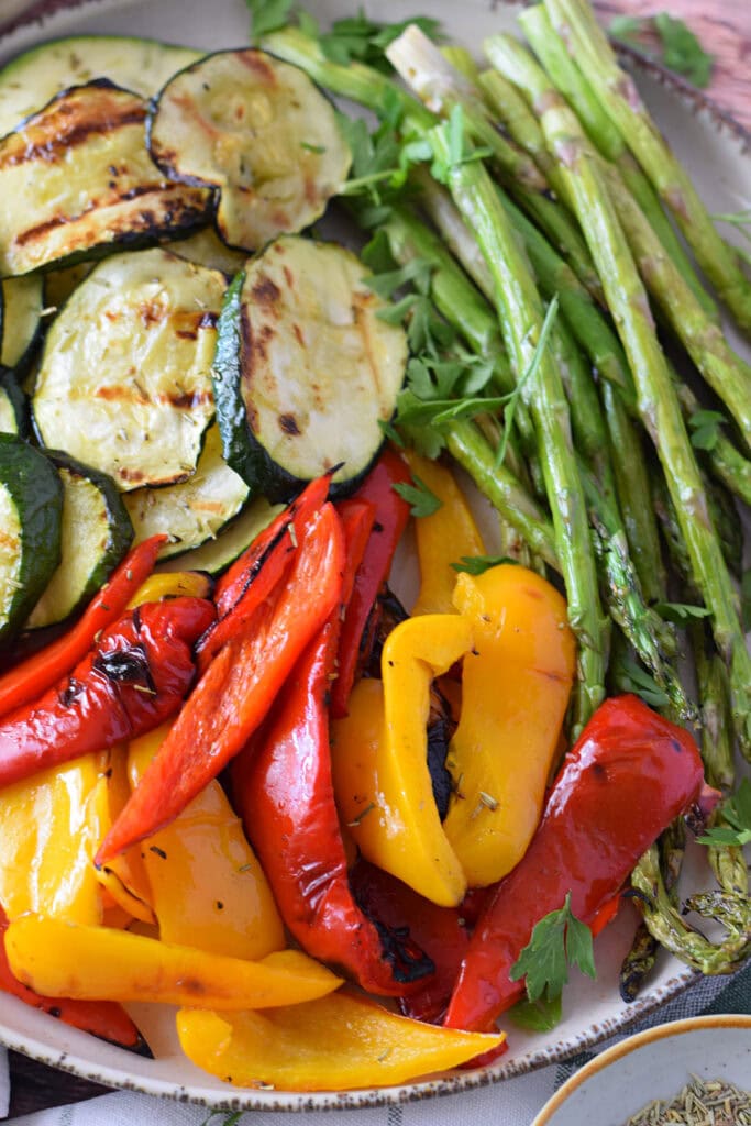 Close up of summer grilled vegetables on a plate.