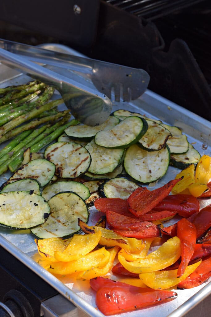 Grilled vegetables on a tray.