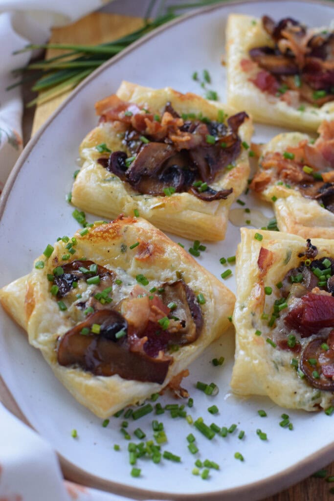 Close up of mushroom puff pastry tarts.