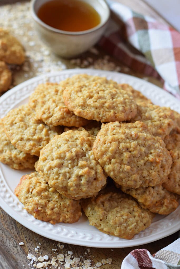 Honey oatmeal cookies on a white plate.
