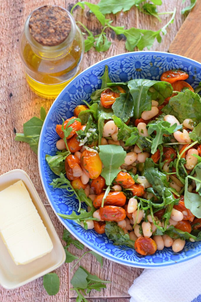 White bean salad with cherry tomatoes.