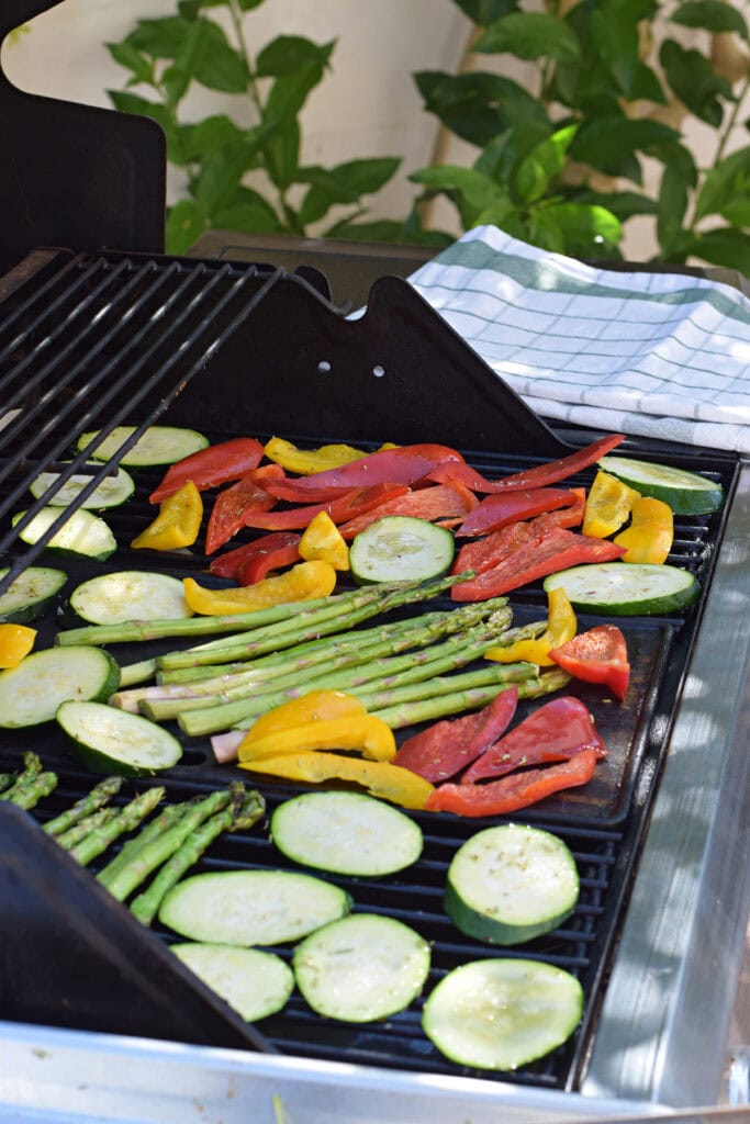 Grilling vegetables on a barbecue.
