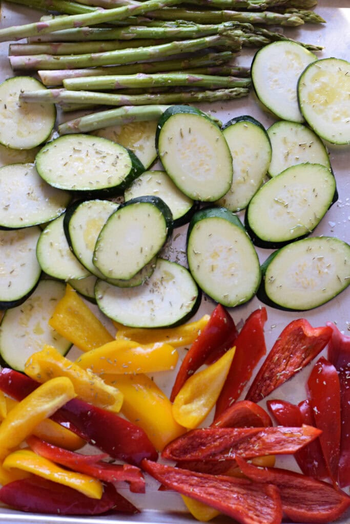 Seasoned vegetables on a tray.