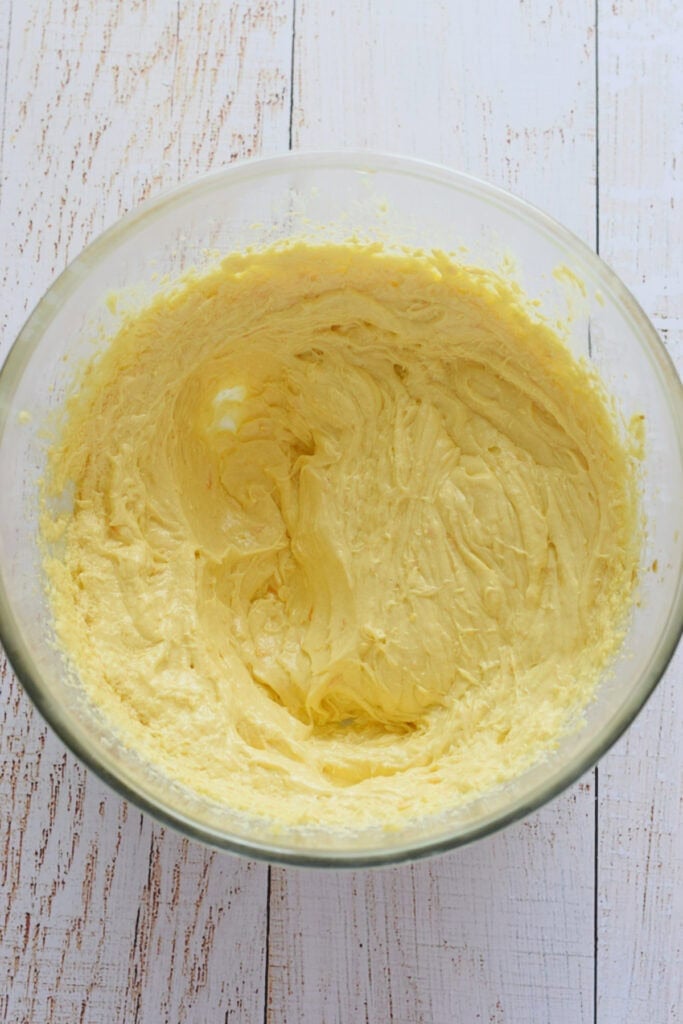 Making muffin batter in a glass bowl.