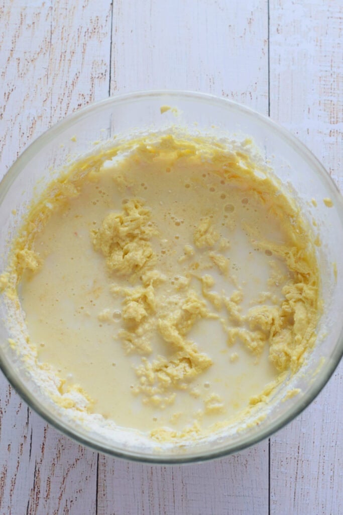 Making muffin batter in a glass bowl.