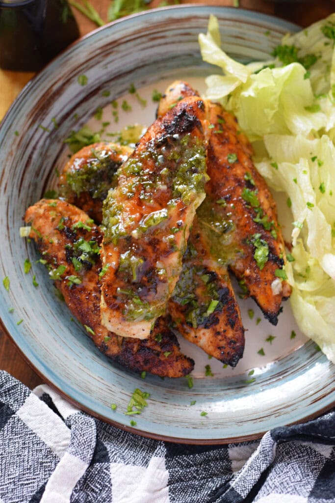 Close up of honey dijon chicken tenders on a plate.