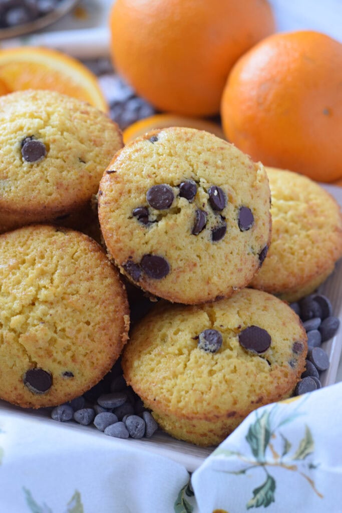 Close up of orange chocolate chip muffins.