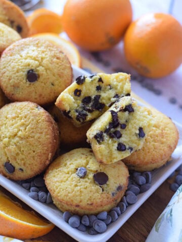 Close up of orange chocolate chip muffins.