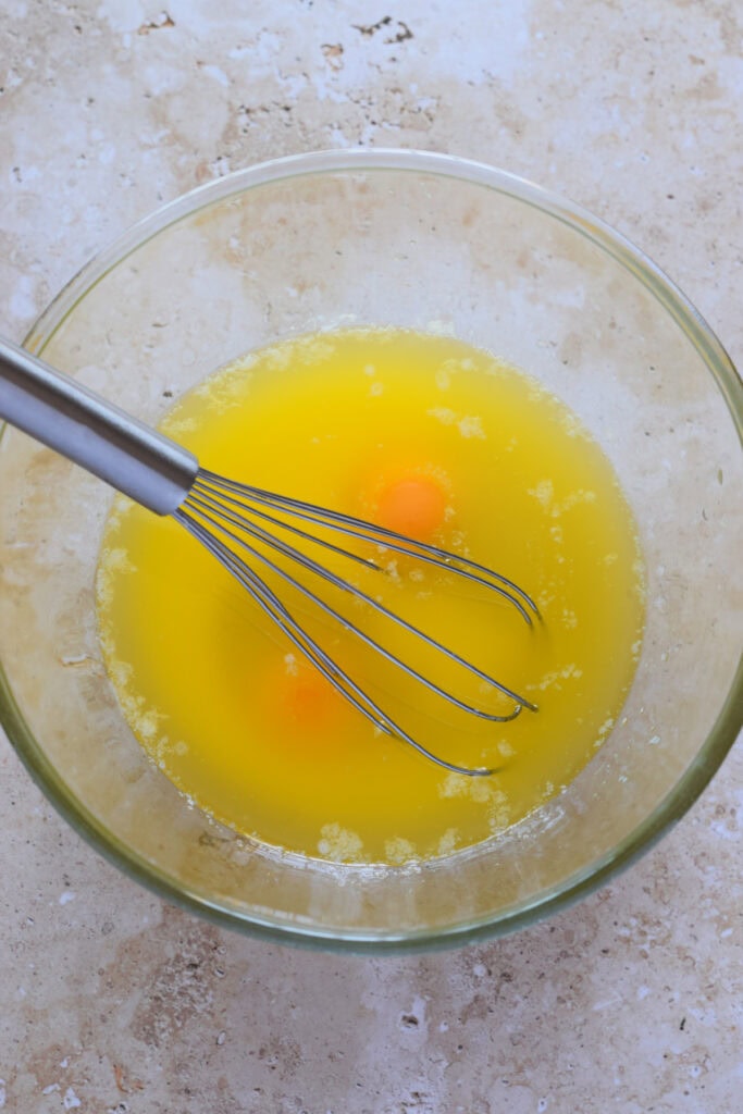 Ingredients in a glass bowl to make cookies.