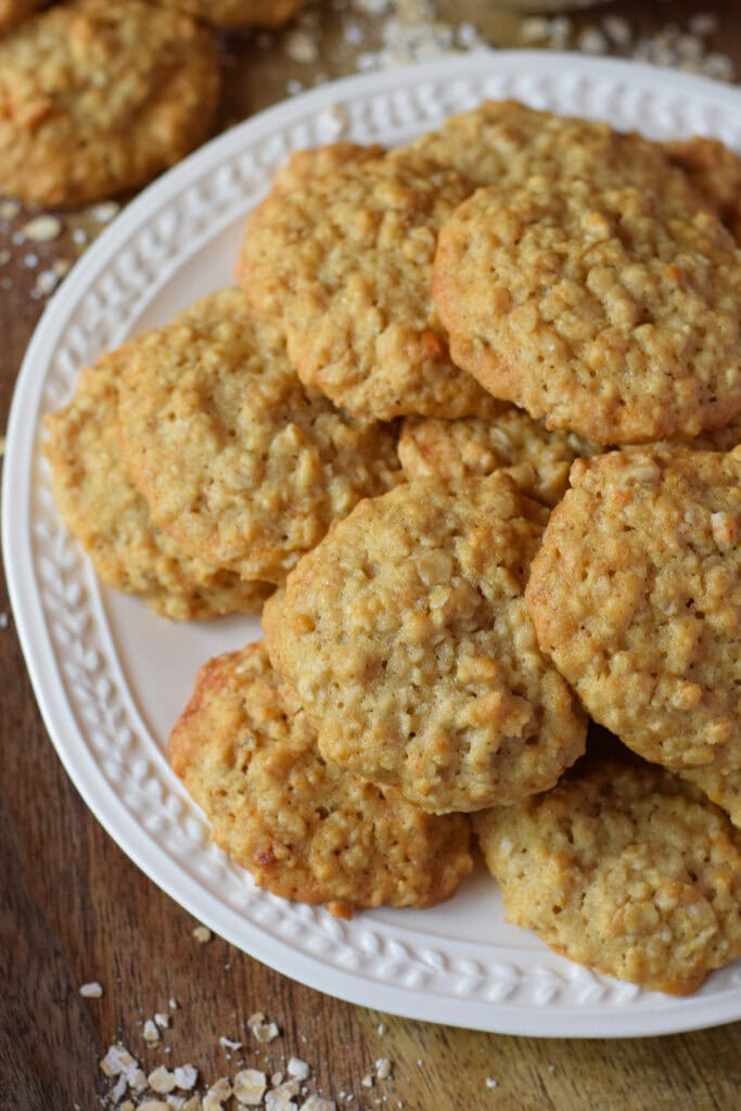 Honey oatmeal cookies on a white plate.