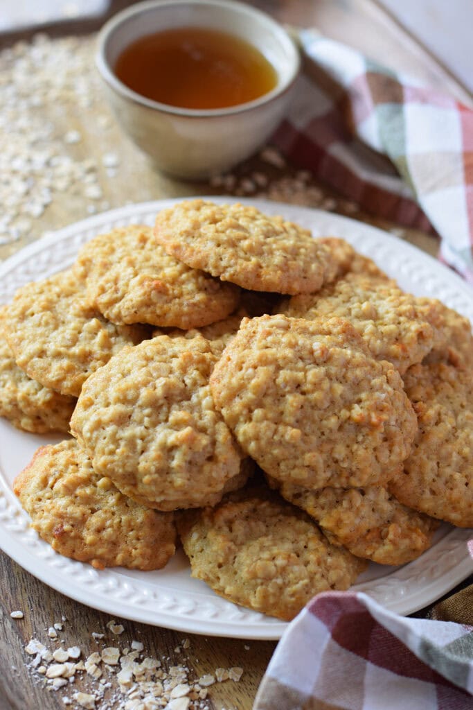 Honey oatmeal cookies on a white plate.