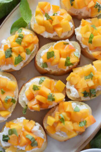 Close up of peach crostini.