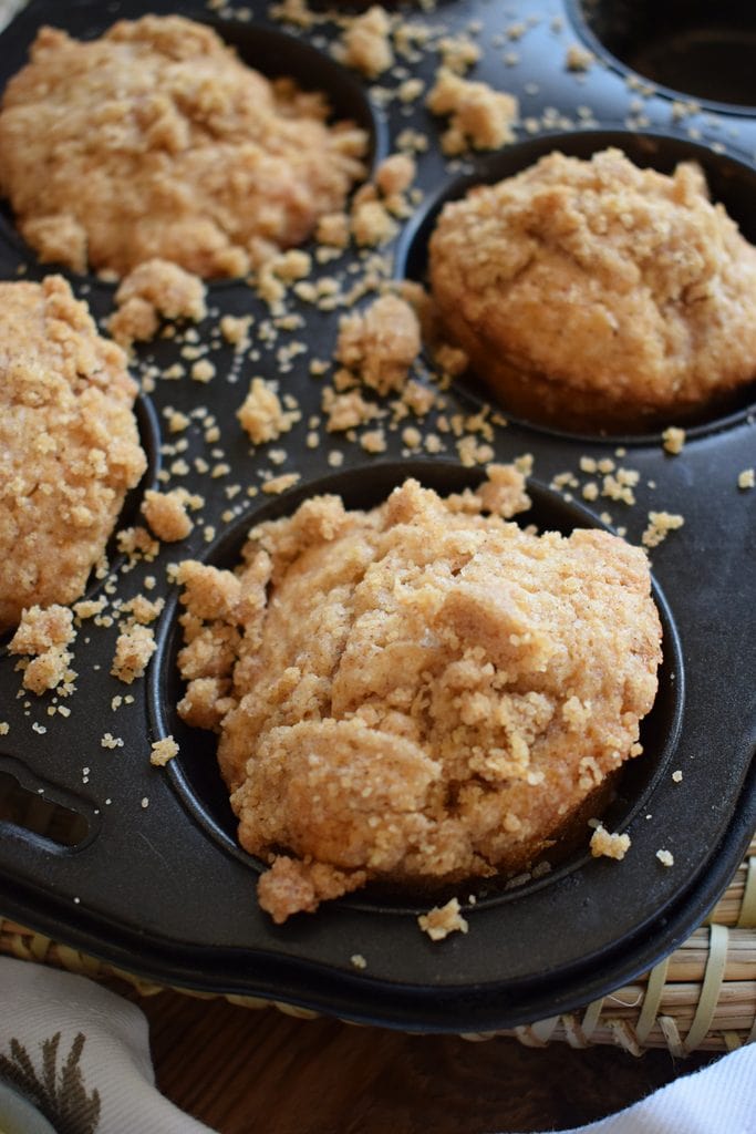 Apple cinnamon muffins in a tray.