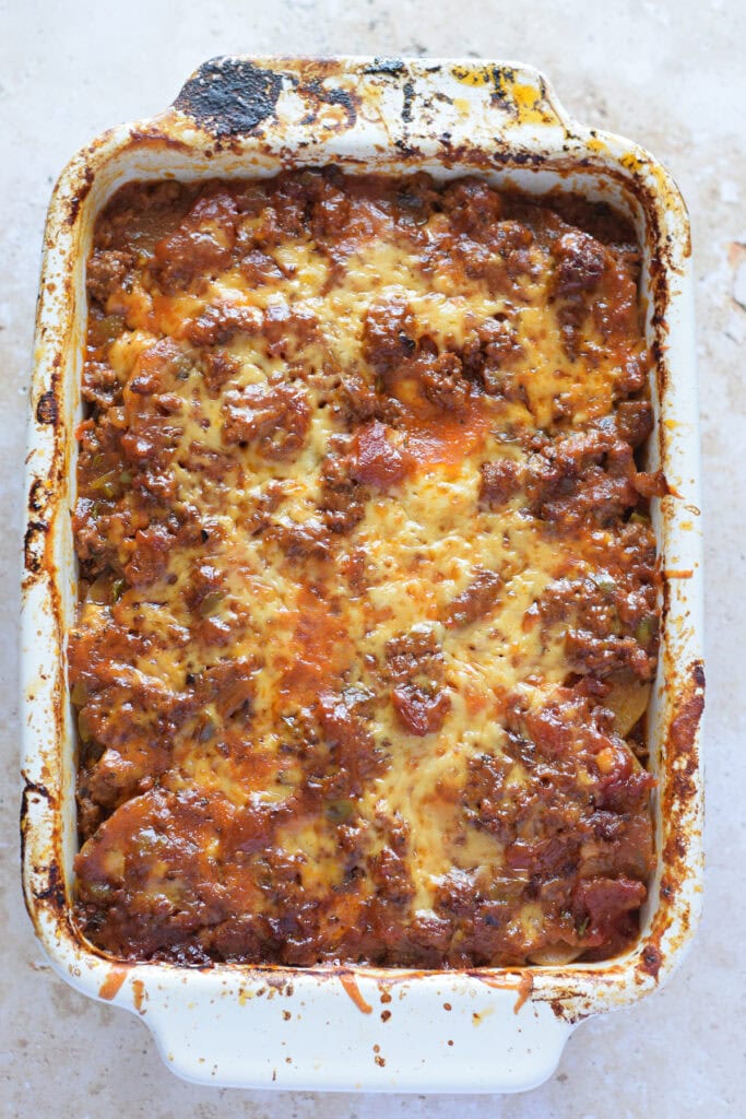 Close up of a ground beef and potato casserole.
