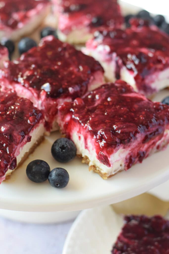 Close up of no bake berry cheesecake bars.