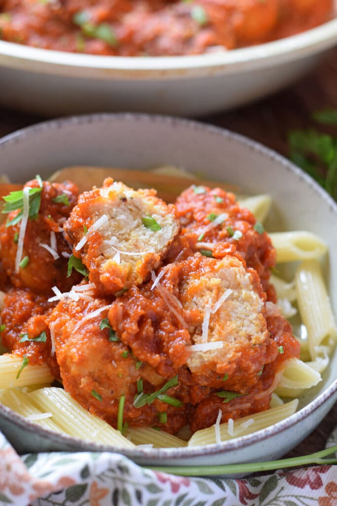 Close up of chicken parmesan meatballs.