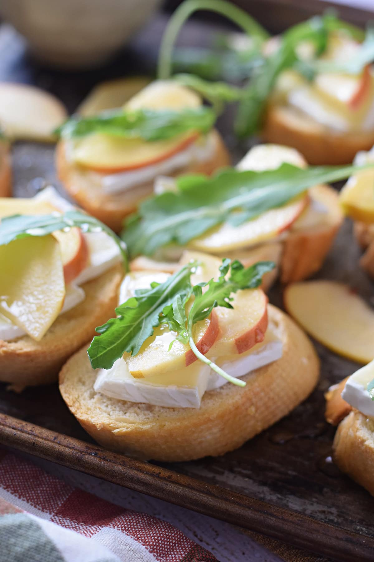 Close up of apple and brie crostini.