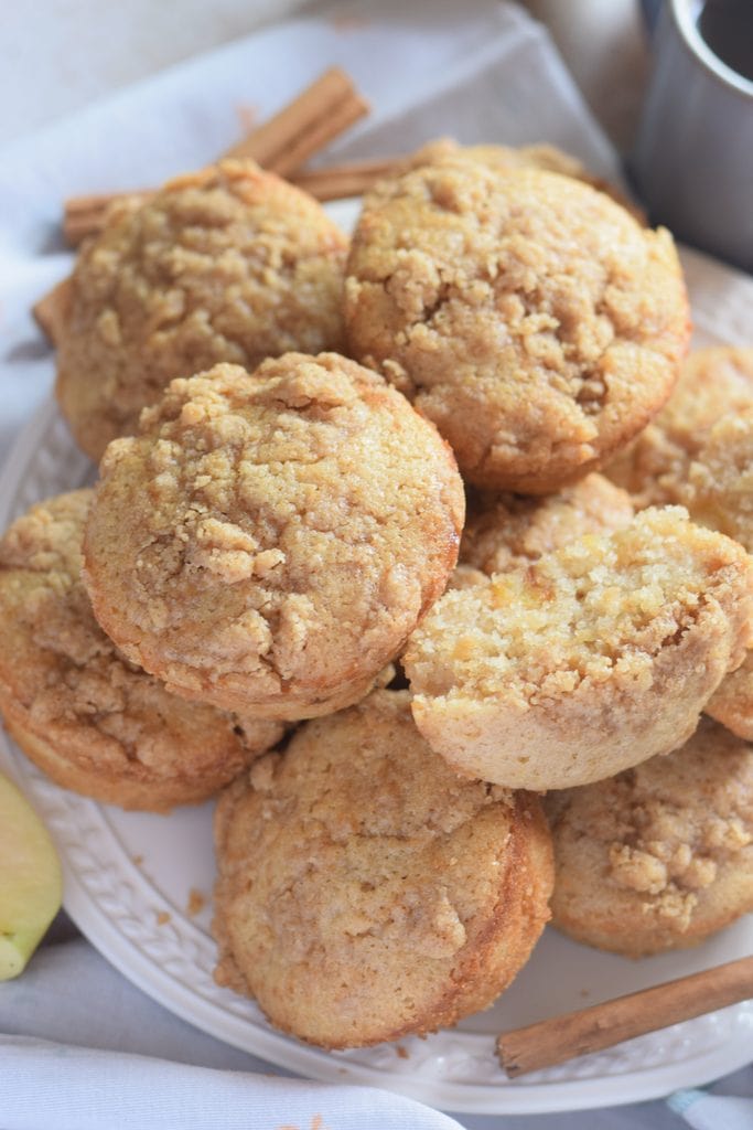 Apple cinnamon muffins on a plate.