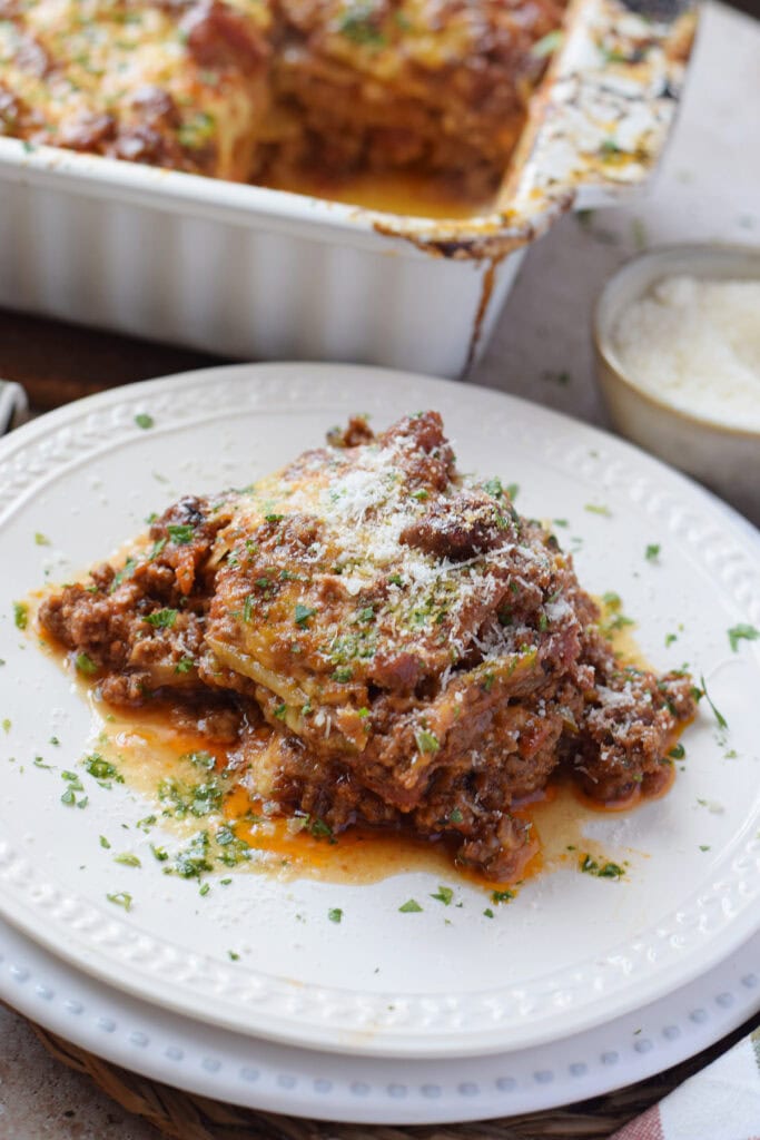 Beef and potato casserole on a white plate.