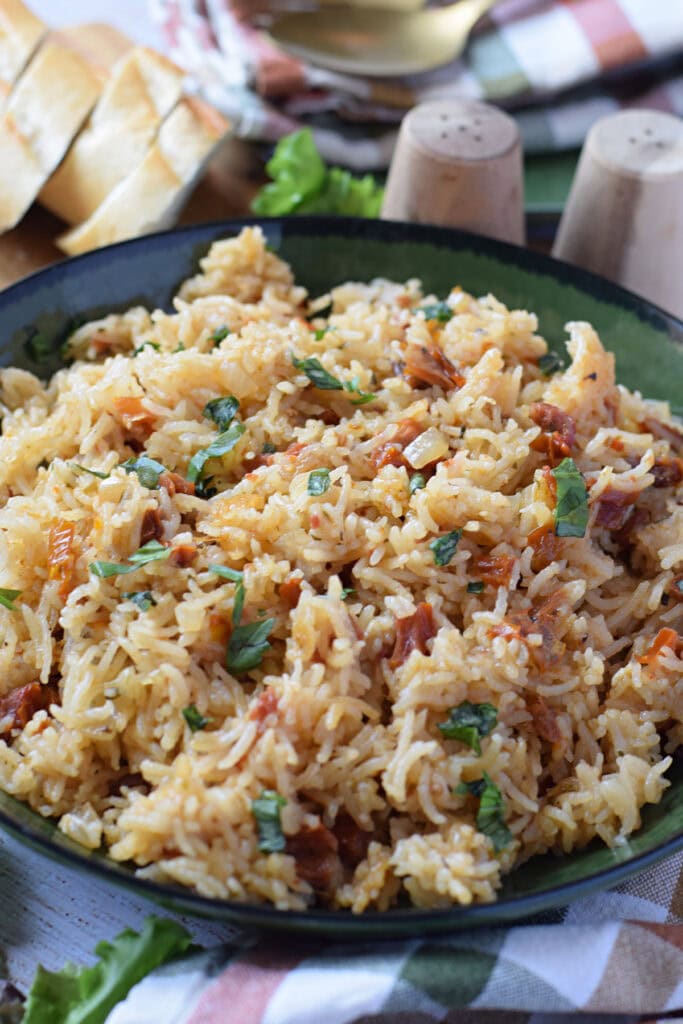 Close up of sun dried tomato pilaf.
