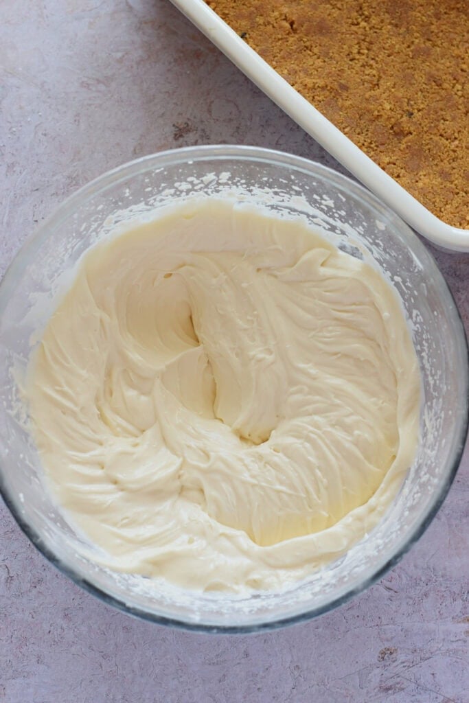 No bake cream cheese filling in a glass bowl.