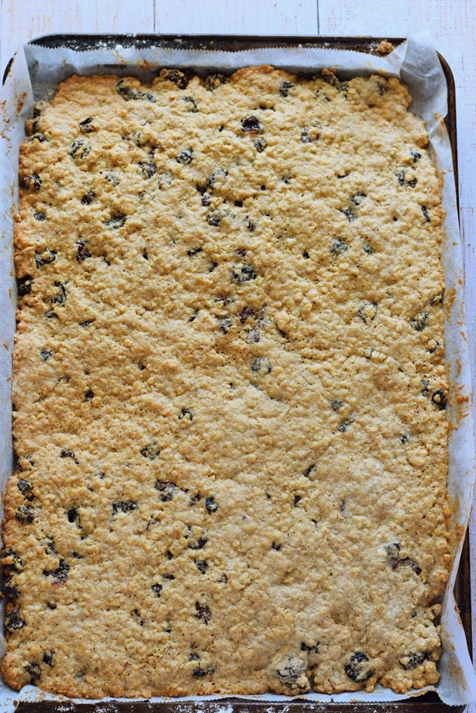 Baked cookie bars in a baking tray.