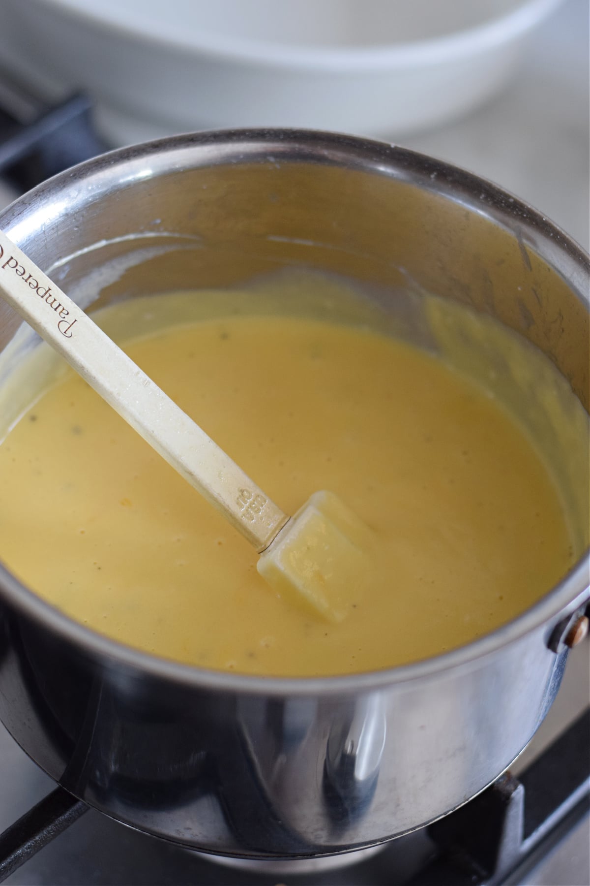 Cheese sauce for pasta in a saucepan.