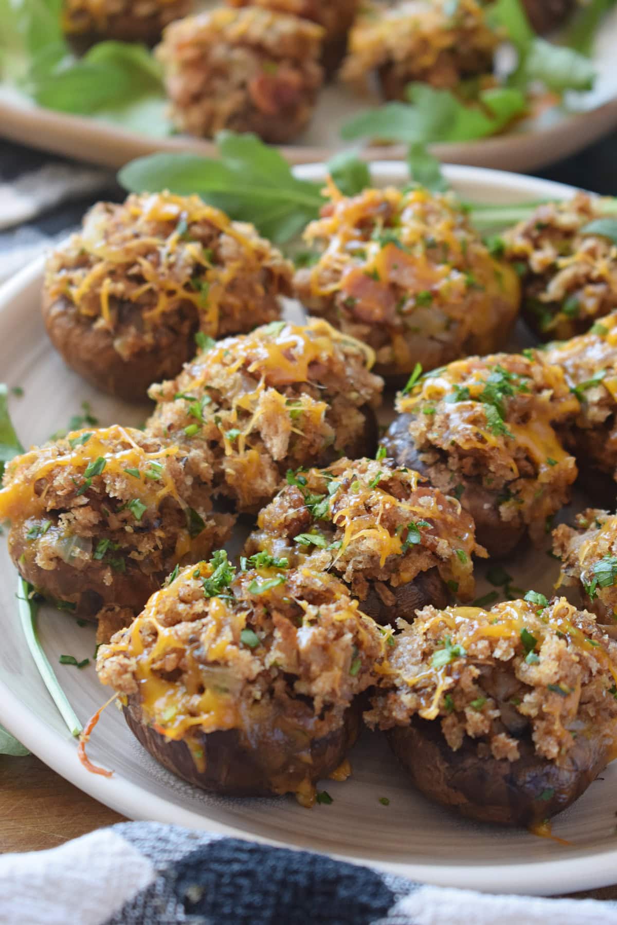 Close up of bacon and cheddar stuffed mushrooms.