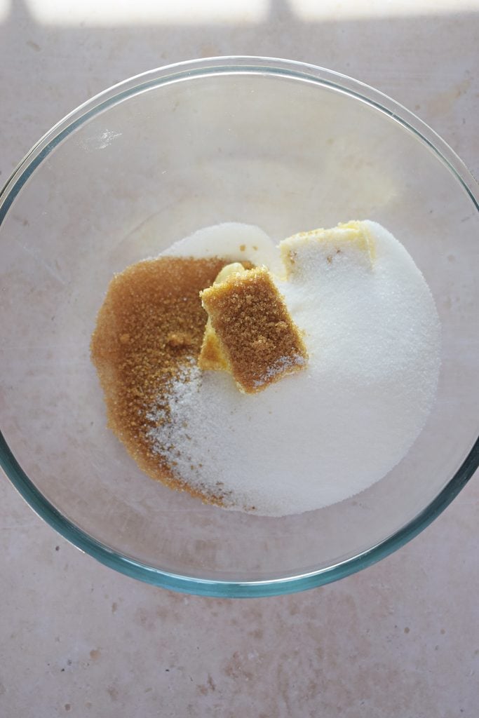Combine butter and sugar in a glass bowl.