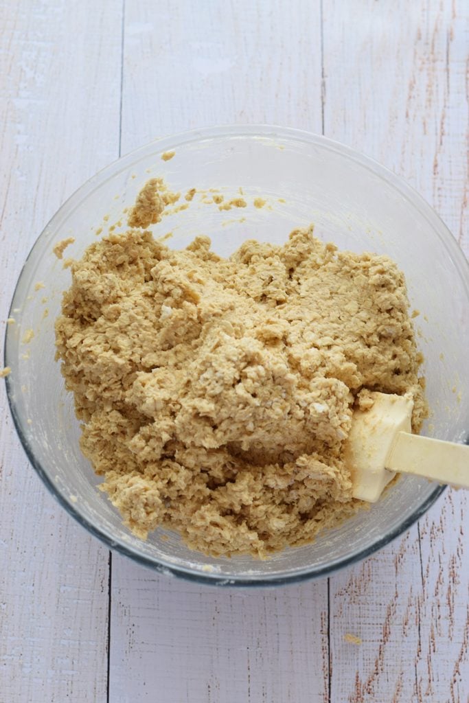 Oat cookie dough in a glass bowl.