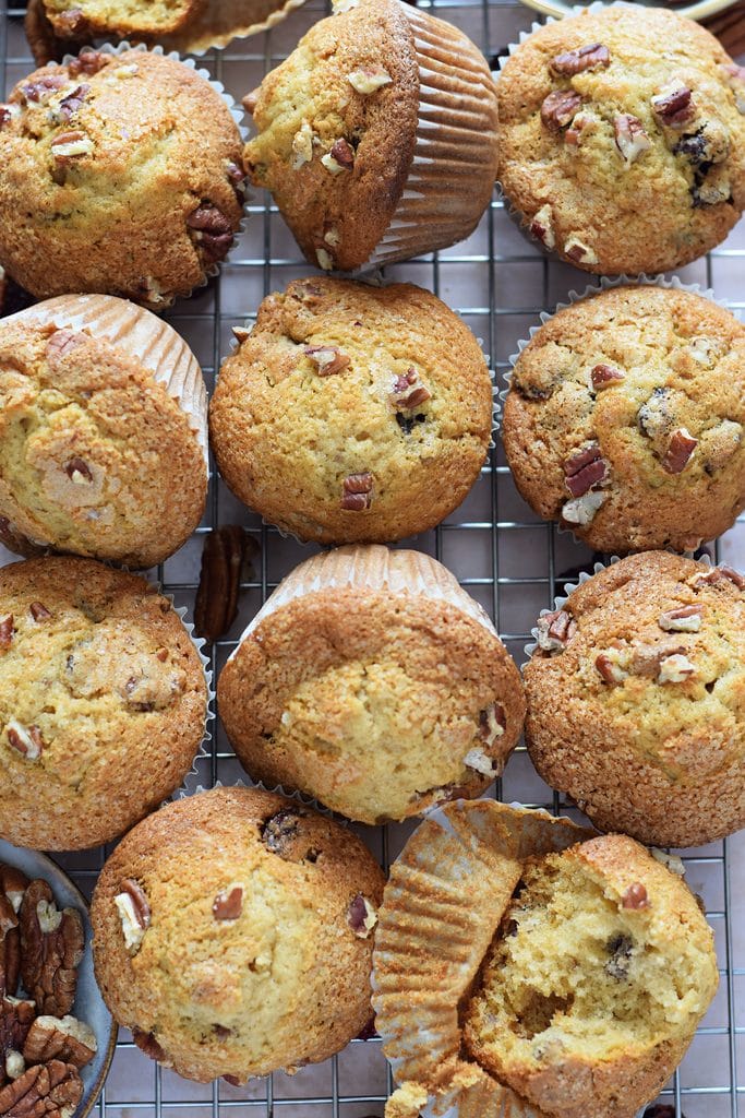 Cranberry pecan muffins on a baking tray.
