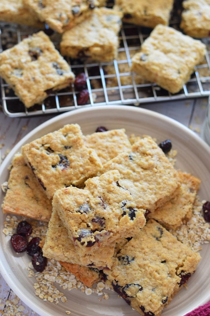 Cranberry oat bars on a plate.
