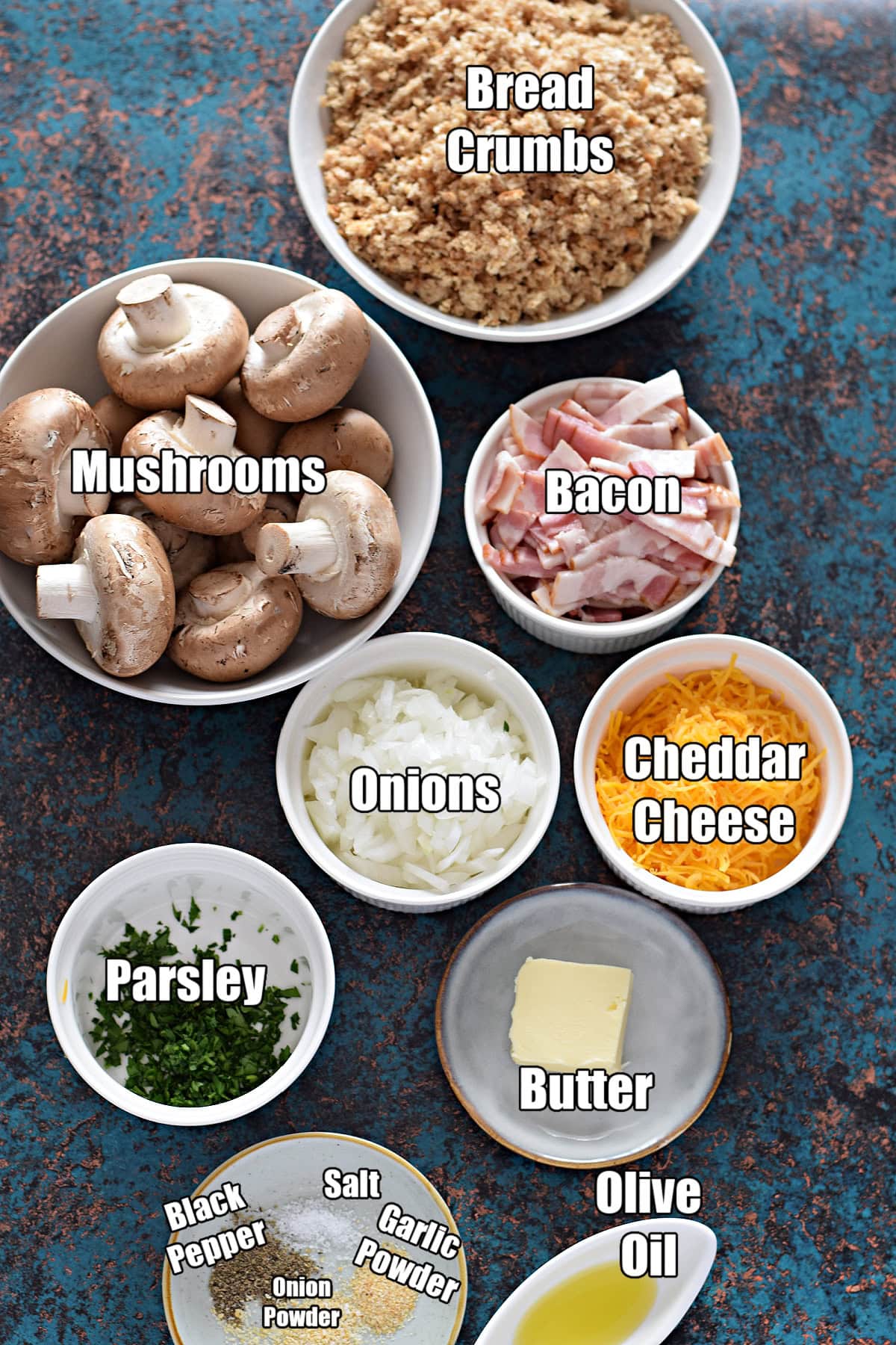 Ingredients to make bacon and cheddar stuffed mushrooms.