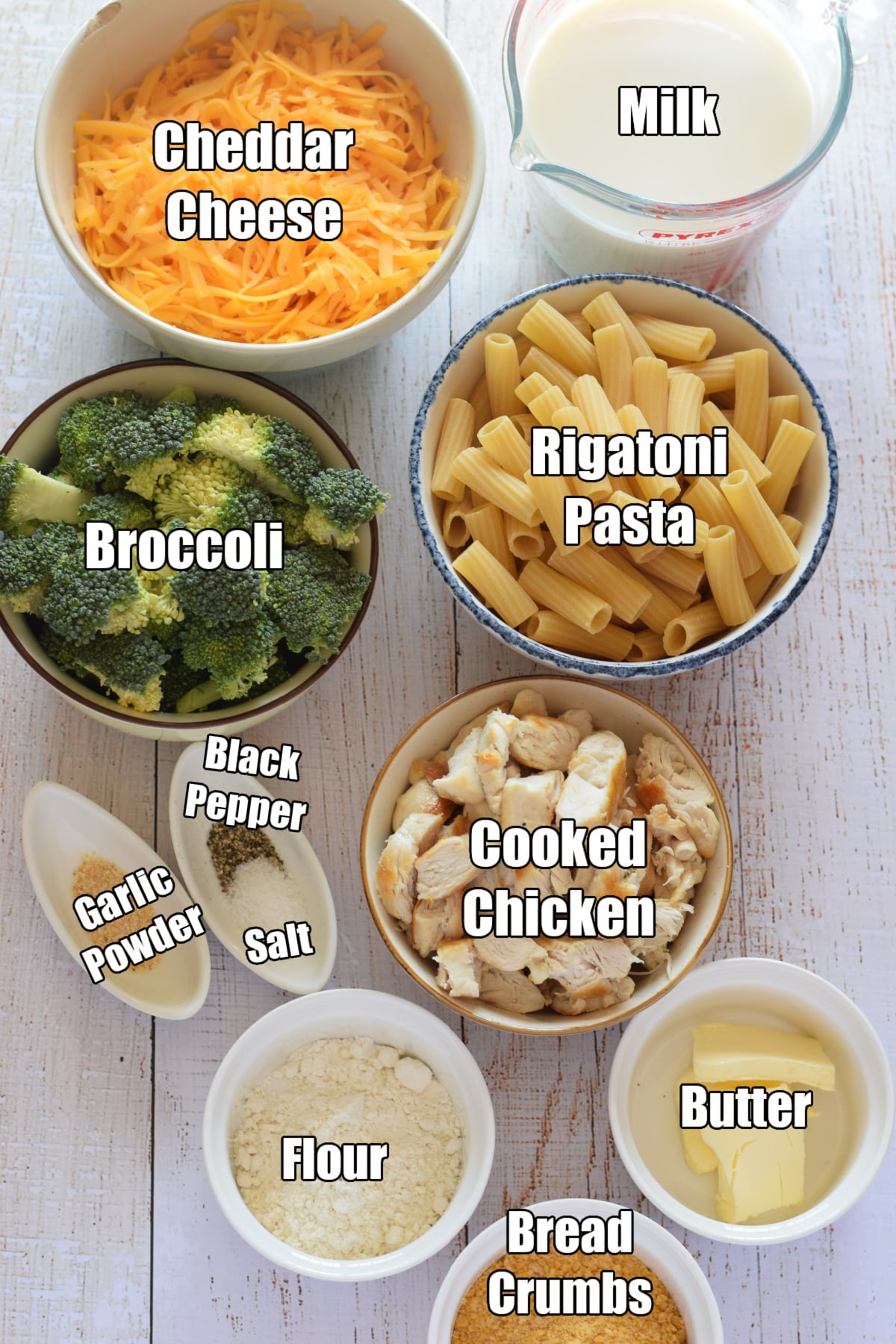 Ingredients to make chicken cheddar and pasta bake.