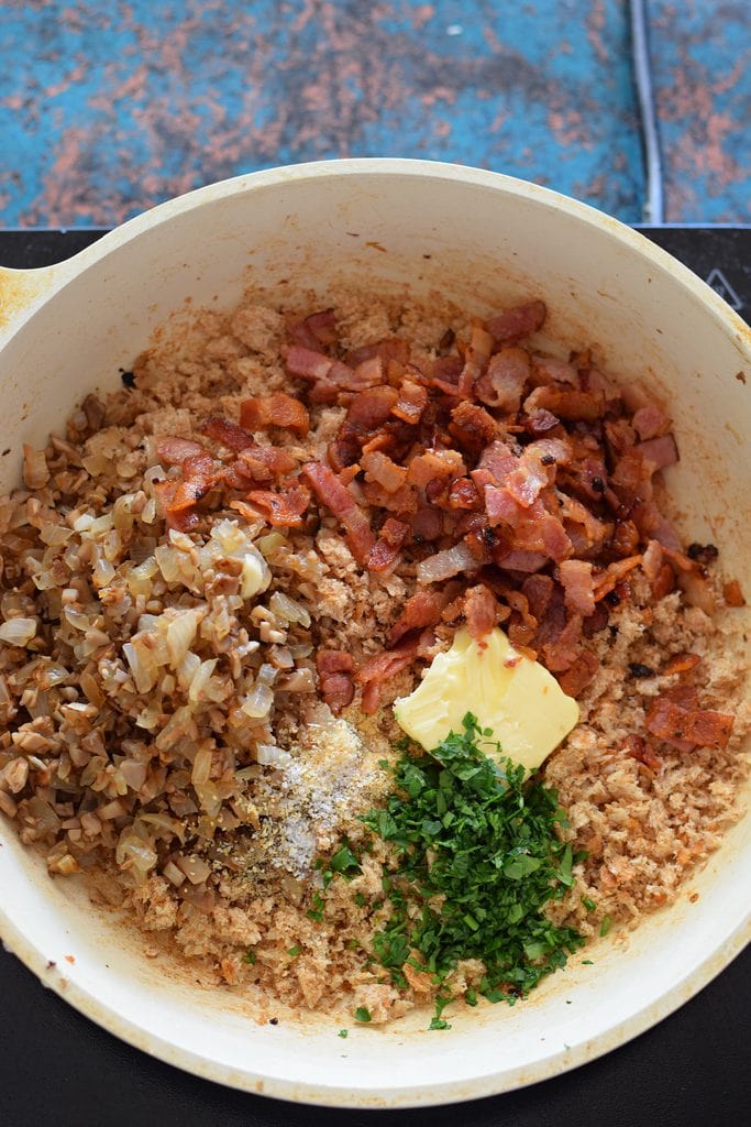 Ingredients to make stuffing in a white stillet.