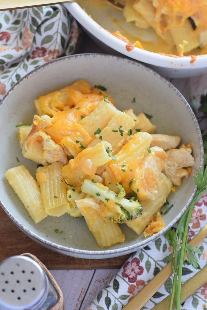Chicken pasta and broccoli in a serving bowl.