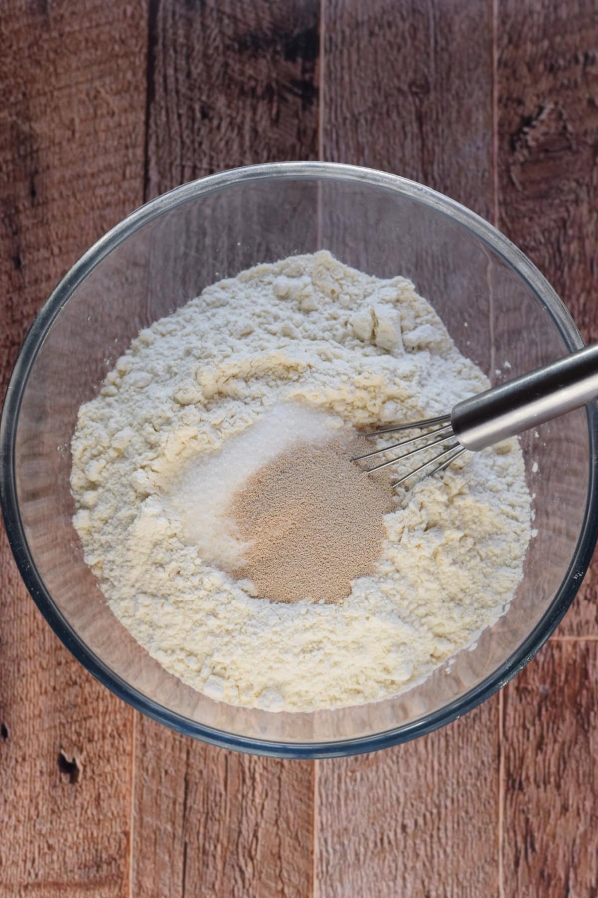 Bread ingredients in a glass bowl.