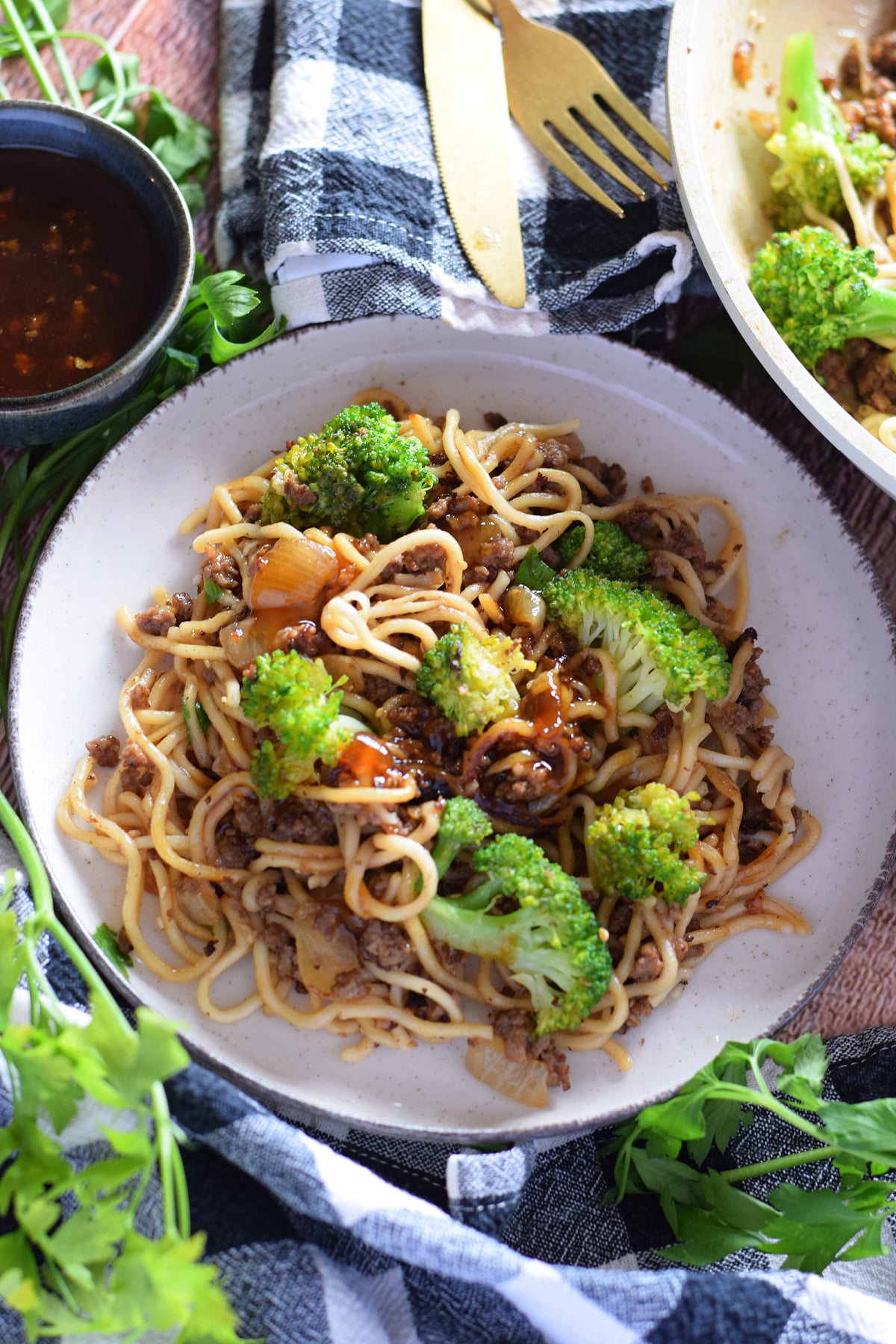 Noodle stir fry with beef and broccoli.