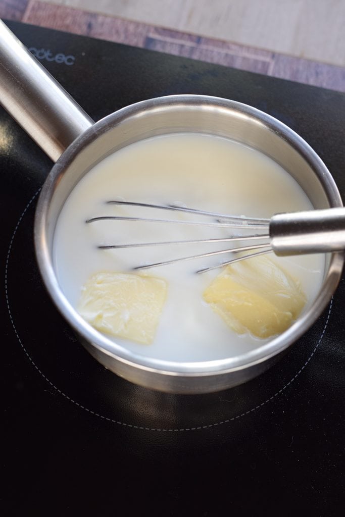 Combined milk, water and butter in a saucepan.