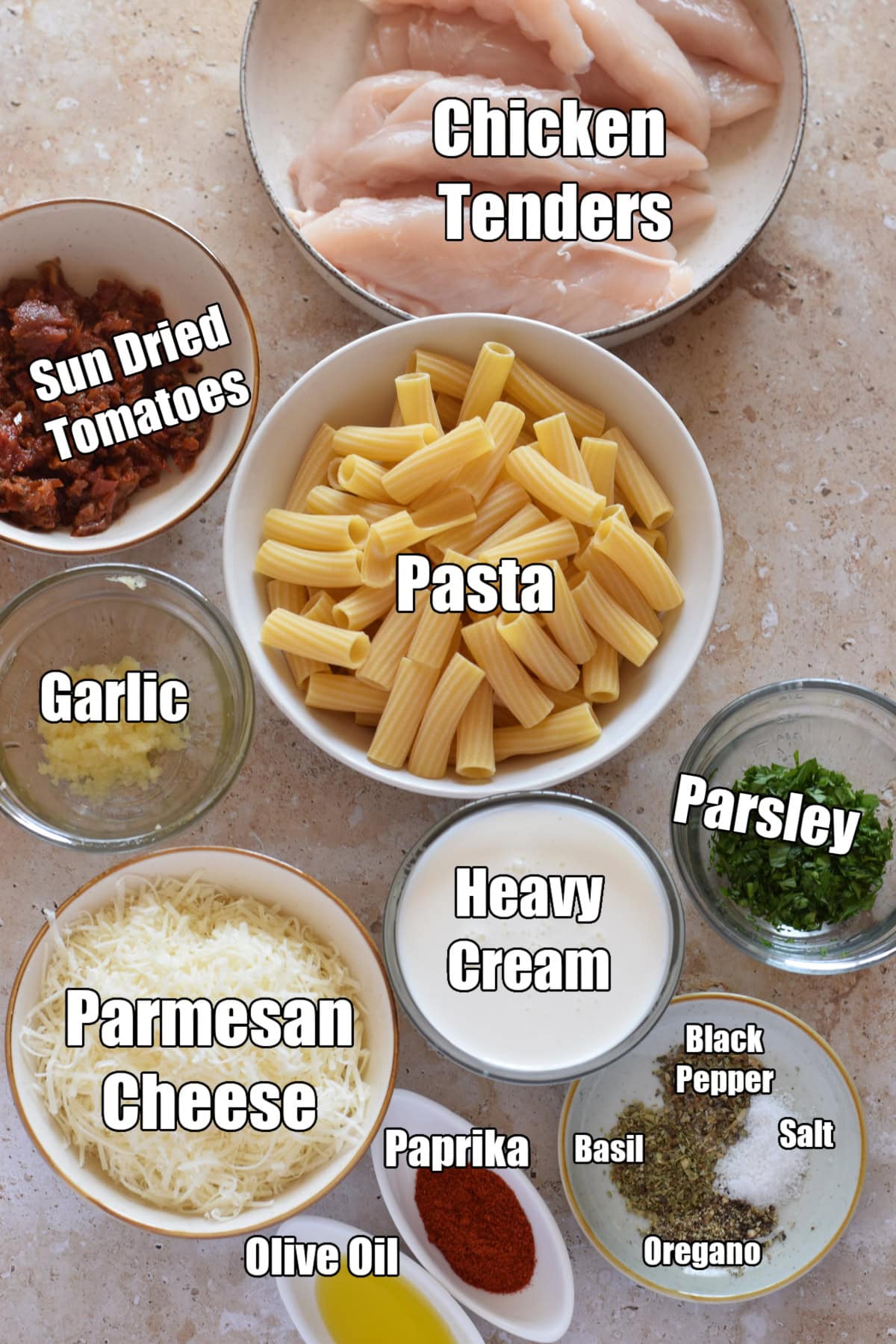 Ingredients to make chicken and sun dried tomato pasta.