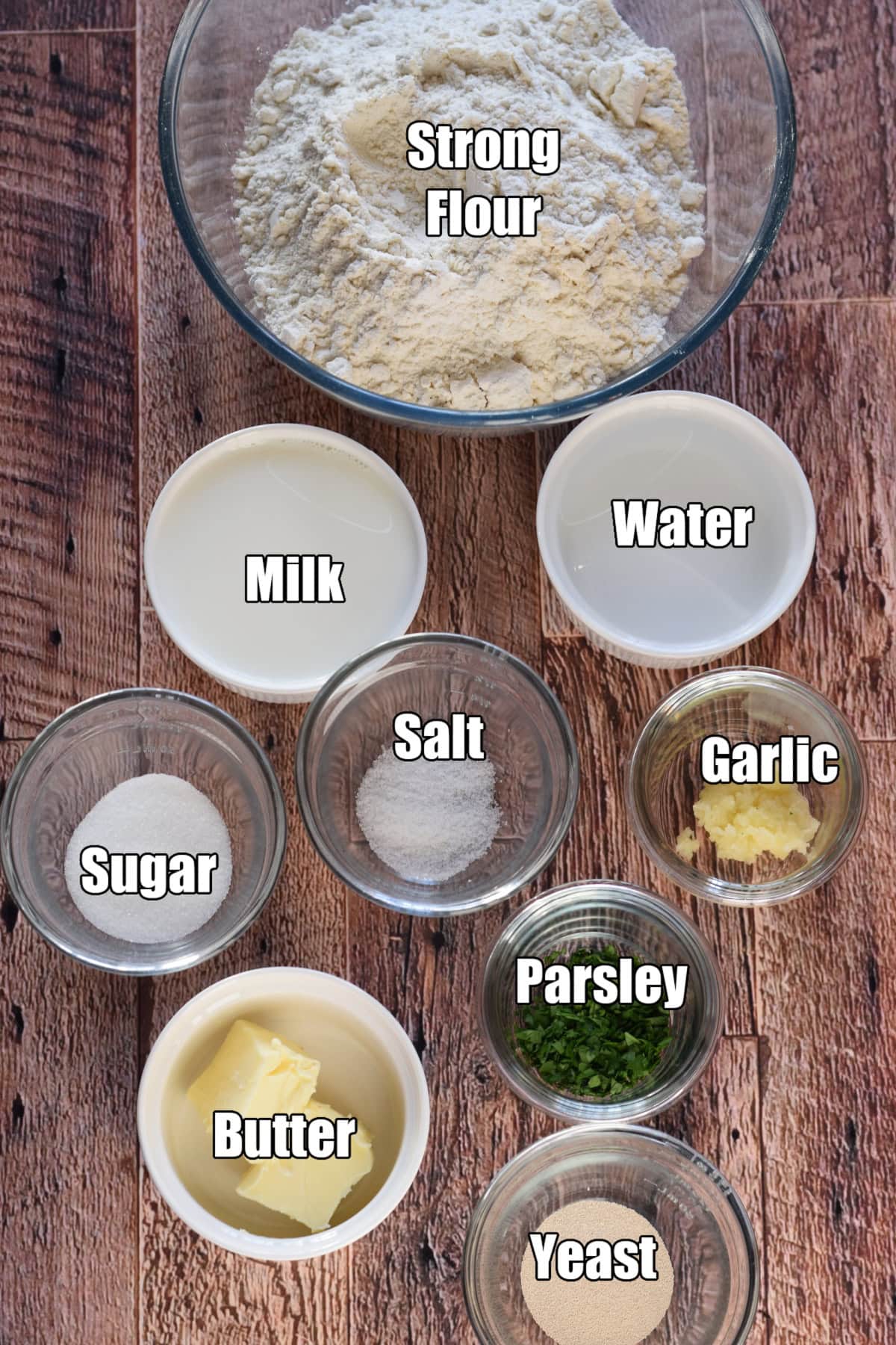 Ingredients to make garlic butter dinner rolls.
