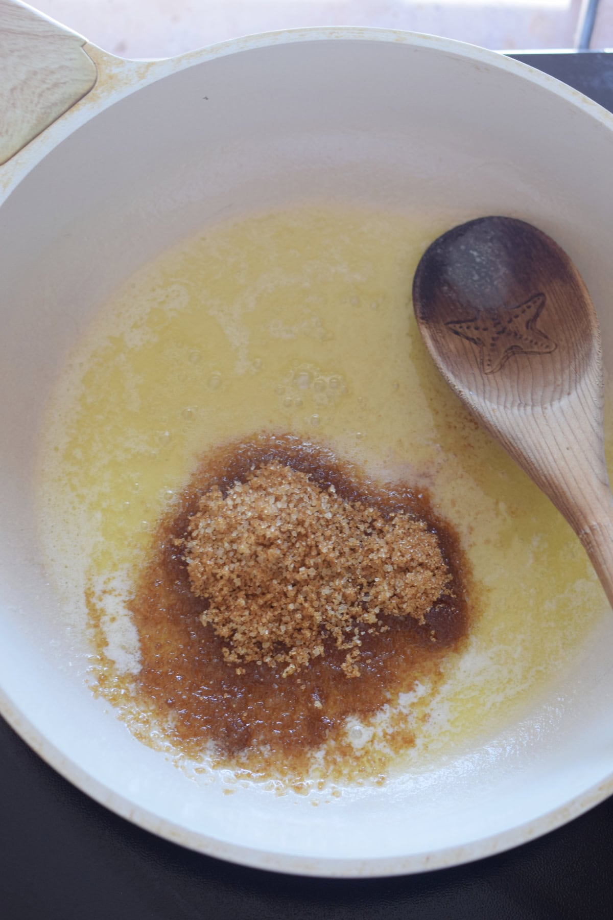 Melted butter in a skillet.